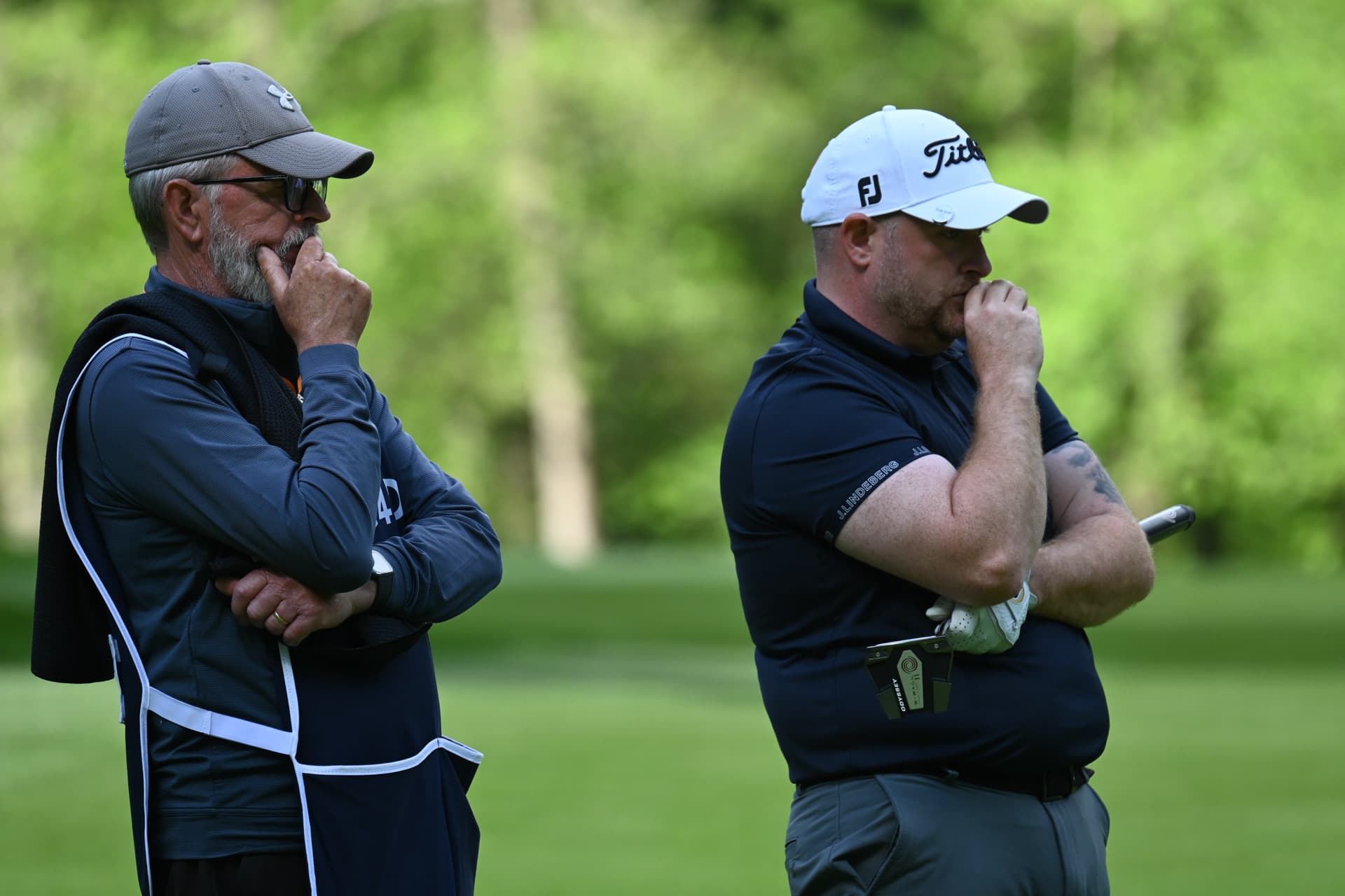 Ollie Greenham and his caddie weighing up a shot at The G4D Open